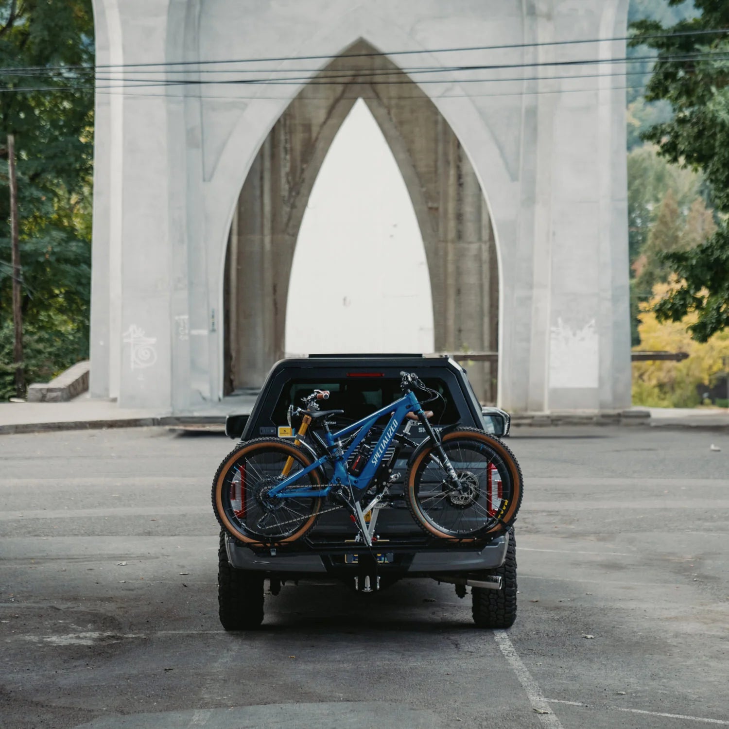 Truck under cement bridge in Portland, Oregon with The Lifter rack