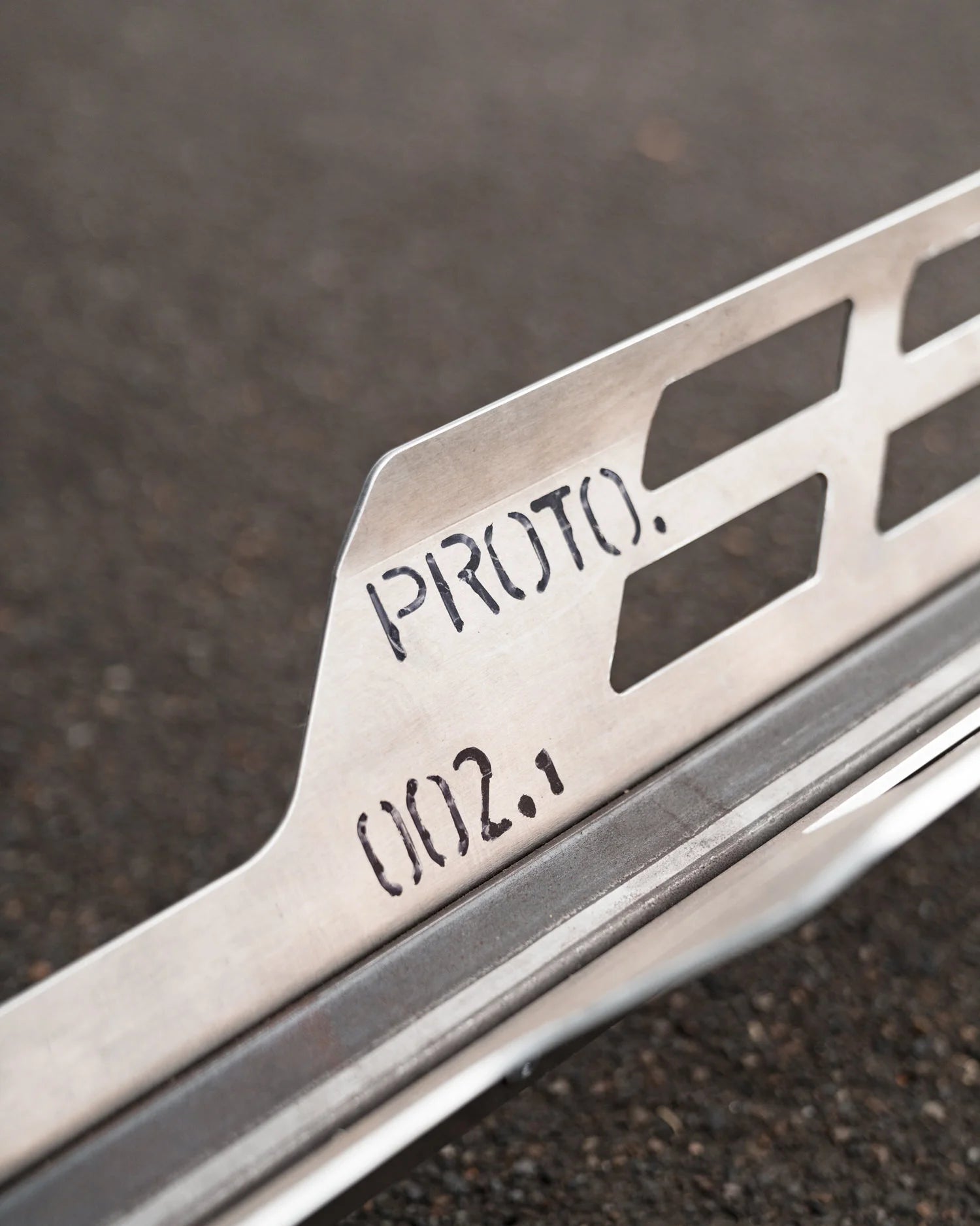 Close up of metal prototype of The Lifter tray