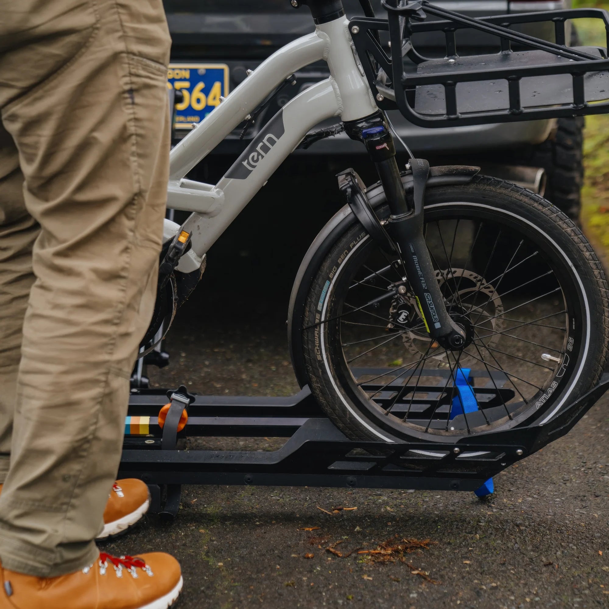 The Lifter rack lowered to the ground, with bike ready to roll off